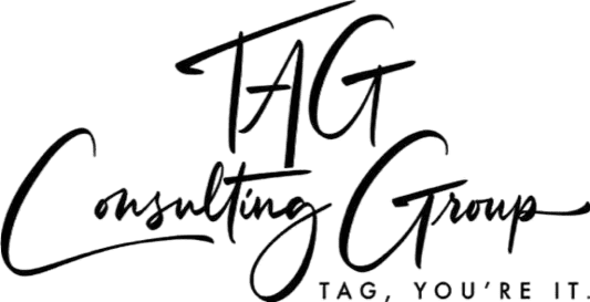Stylized black logo with the text 'TAG' and cursive 'saluting G'.