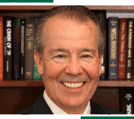 Image of a smiling professional man.